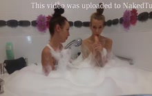 Hotties playing with each other in bath tub